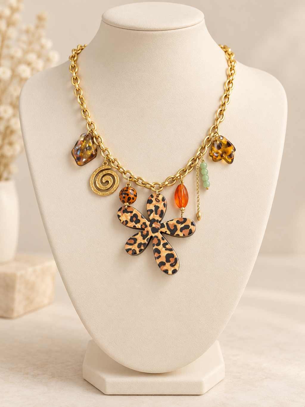 Collier doré à fleur léopard et pampilles