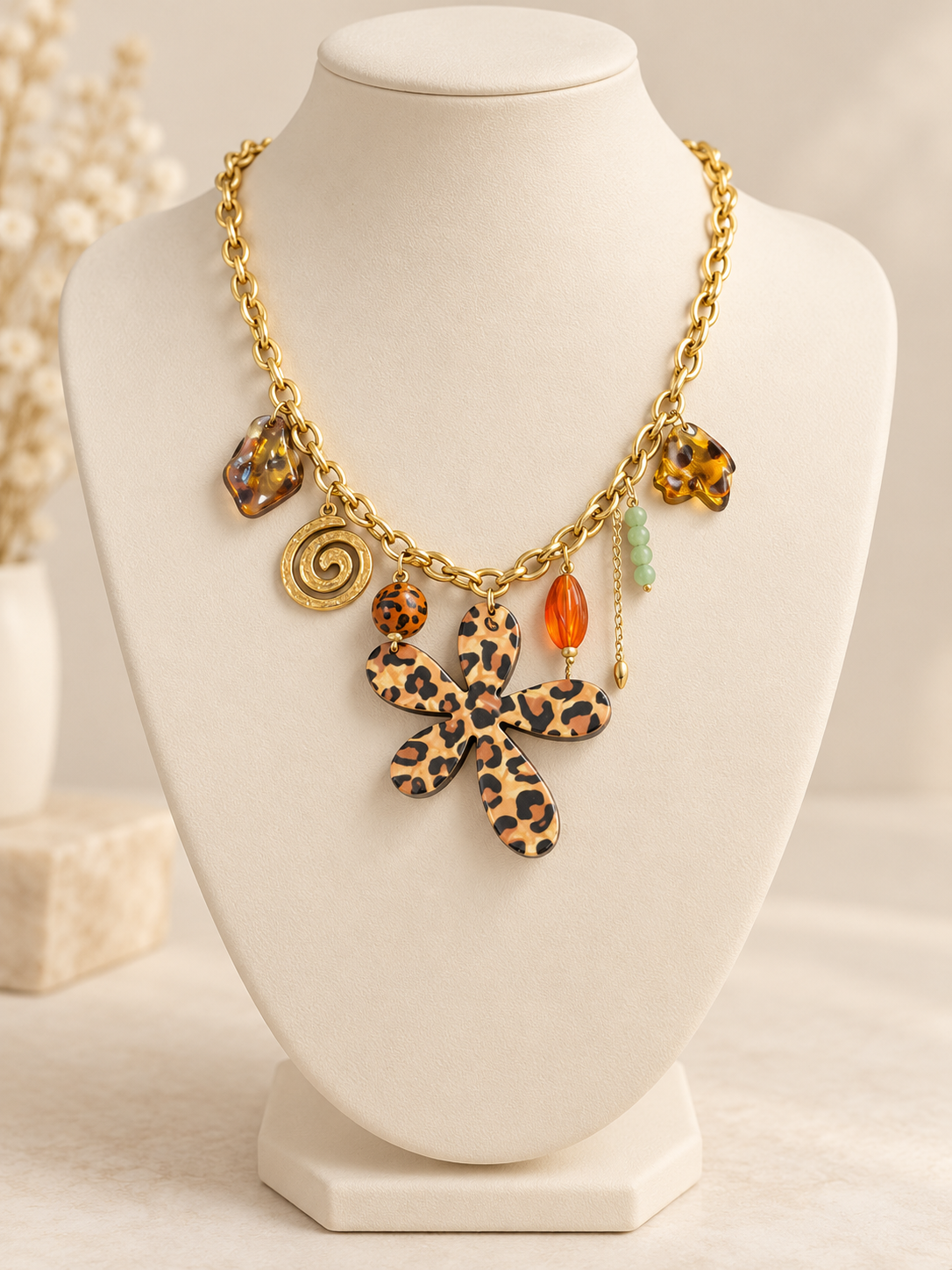 Collier doré à fleur léopard et pampilles