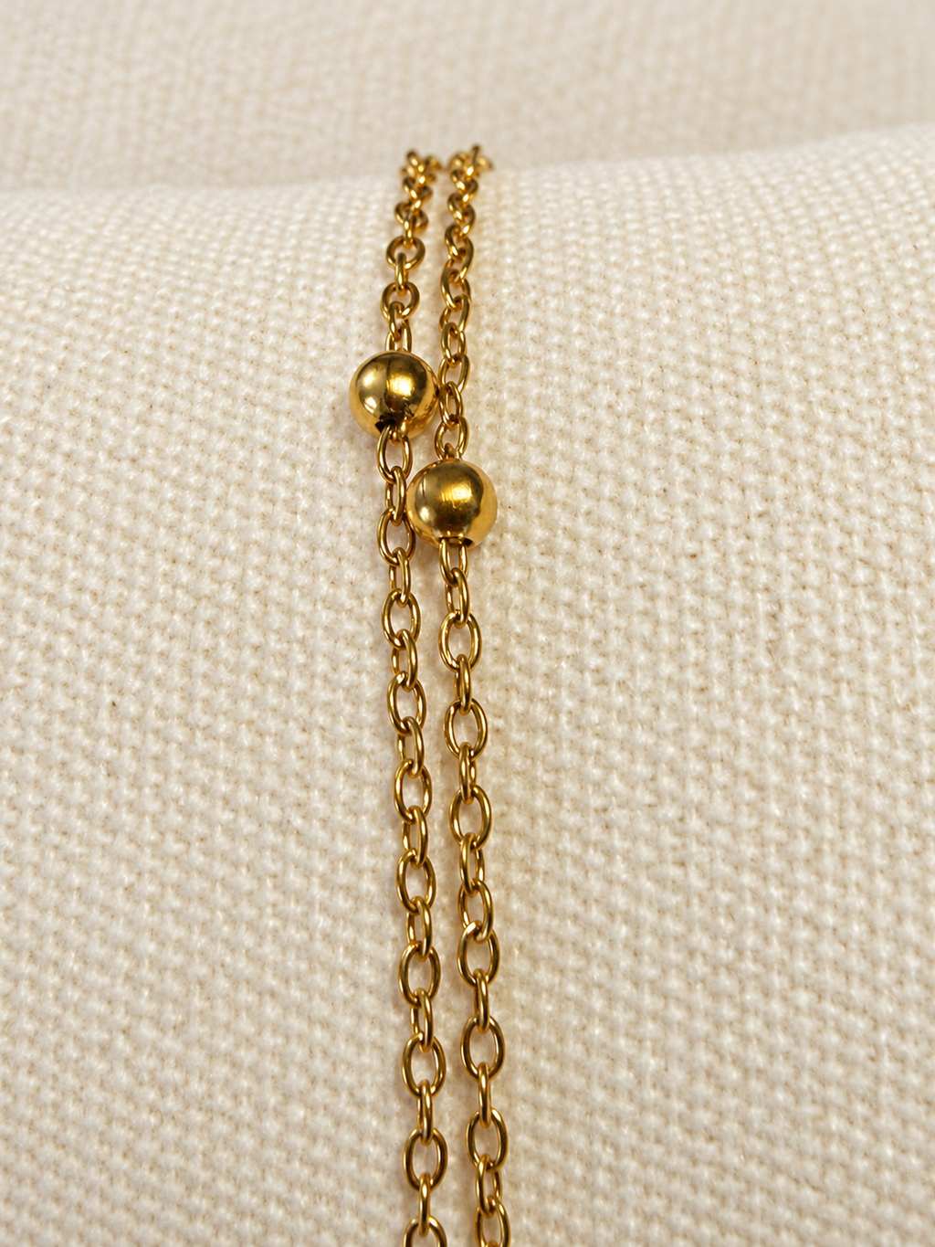 Bracelet doré double chaîne à petites boules