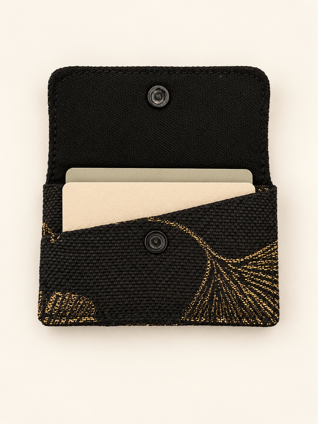 Porte-cartes artisanal noir et doré – Motif feuillage